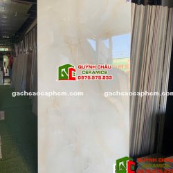 Gạch lát nền 60x120 kem vàng vân rạn bóng kính                          