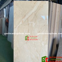 Gạch lát nền vàng kem vân đá 60x120 bóng kiếng
