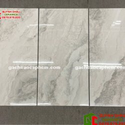 Gạch nhập khẩu Malaysia 60x120 bóng kiếng xám kem vân đá