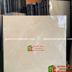 Gạch xương đá porcelain 1000x1000mm bóng kiếng màu kem vân đá