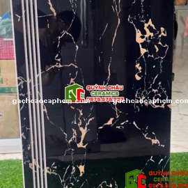 Gạch 47x100 đen vân cam cầu thang tam cấp