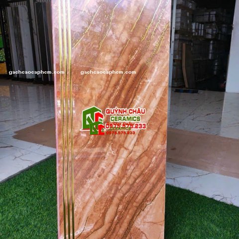 Gạch cầu thang 47x120 nhũ vàng khắc kim vân đá nâu đỏ
