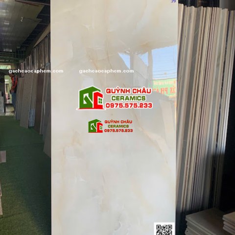 Gạch lát nền 60x120 kem vàng vân rạn bóng kính                          