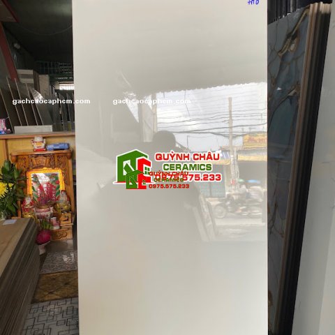 Gạch lát nền 60x120 màu trắng sữa bóng kính            