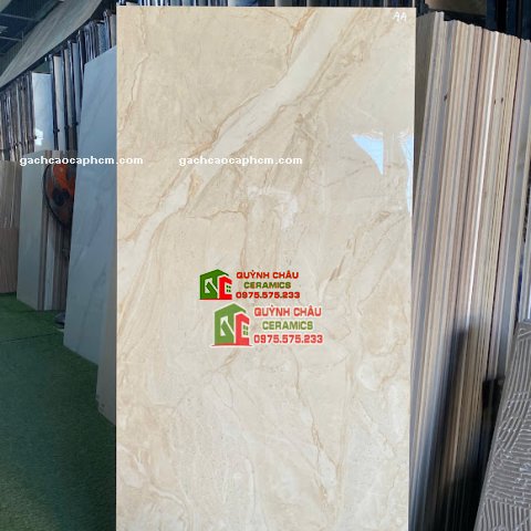 Gạch lát nền vàng kem vân đá 60x120 bóng kiếng