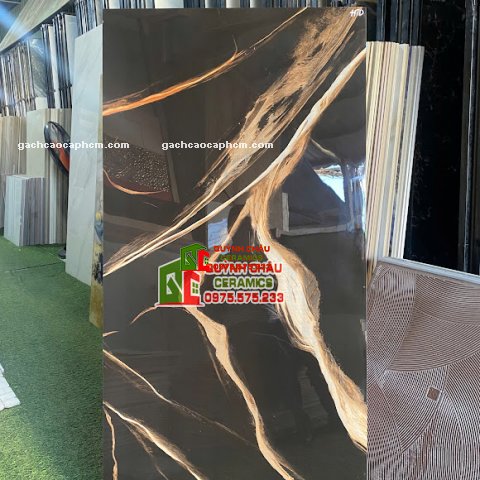 Gạch ốp lát ấn độ 60x120 màu đen vân vàng cam siêu bóng