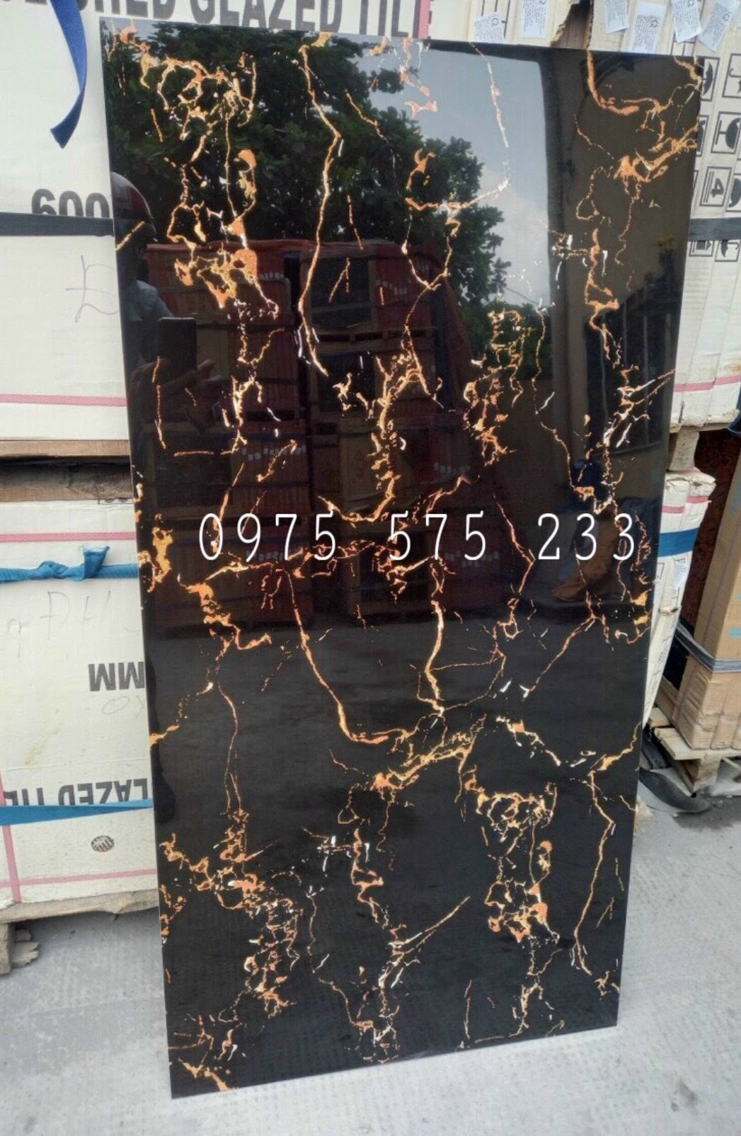 Gạch siêu bóng khắc kim 60x120 đen vân cam tia sét chớp ốp lát cao cấp 07