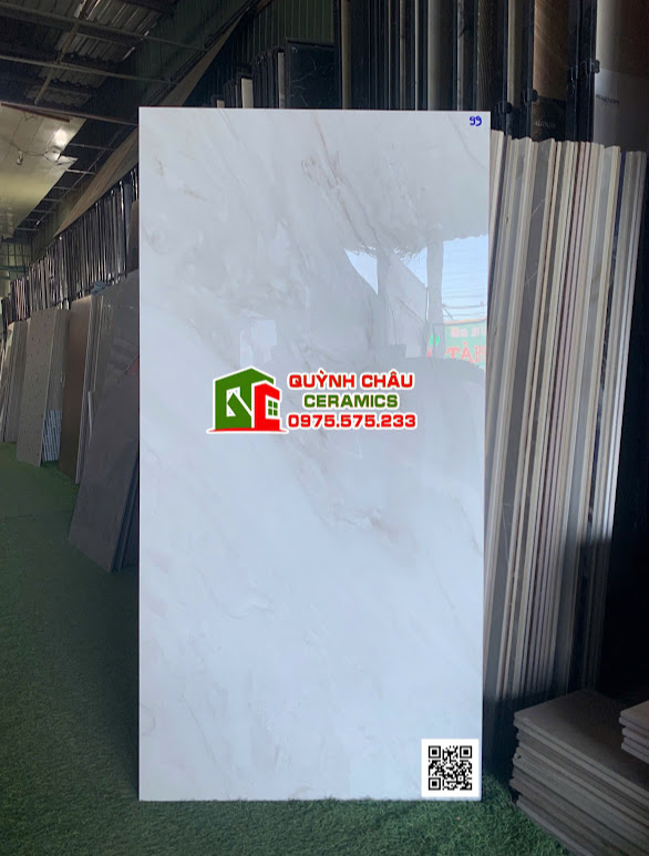 Gạch lát nền 60x120 kem hồng vân sóng bóng kính