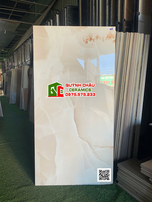 Gạch full body 60x120 kem vàng cam bóng kính