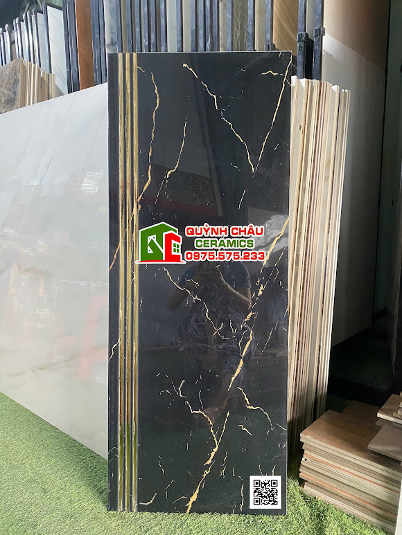 Gạch lát cầu thang đen vân nhũ vàng 47x120 trung quốc