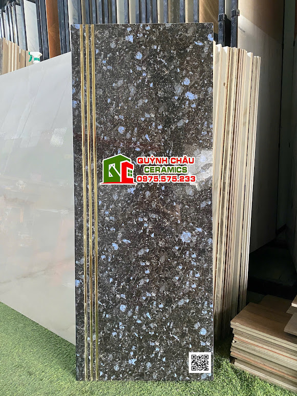Gạch lát cầu thang 47x120 vân đá hoa cương đen xanh phủ nhũ vàng