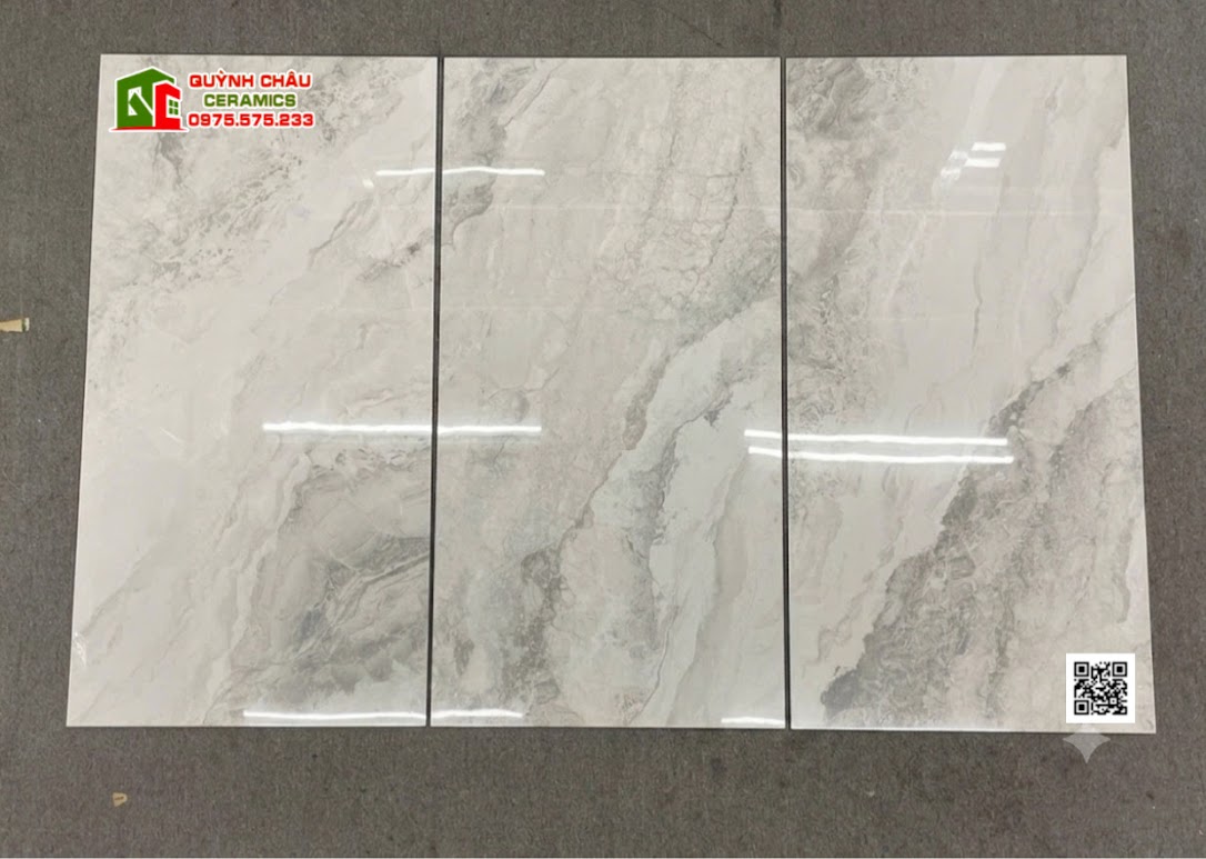 Gạch lát phòng khách 60x120 vân đá xám kem bóng kiếng cao cấp