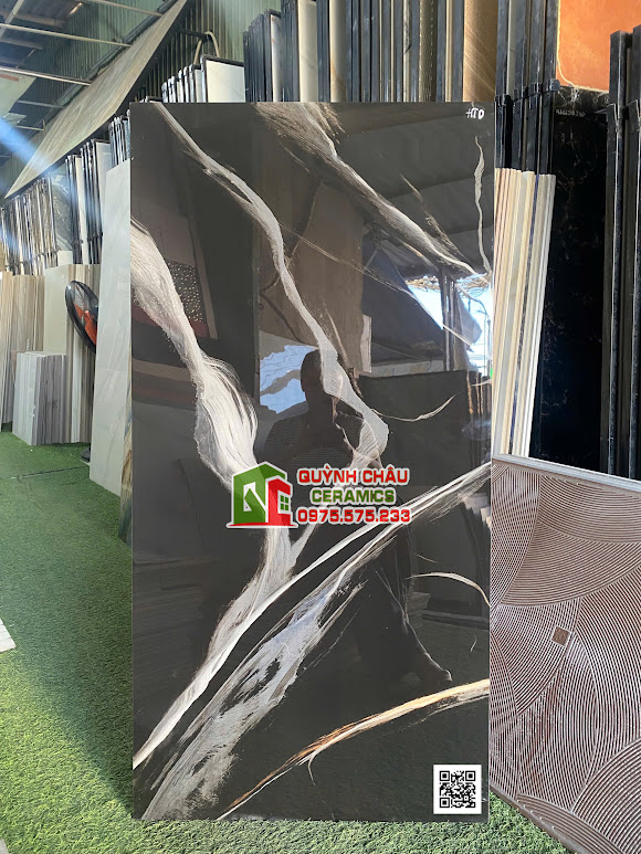 Gạch nhập khẩu 60x120 siêu bóng màu đen vân đá vệt trắng