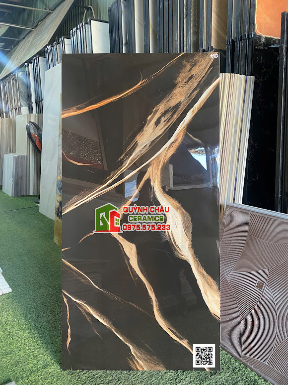 Gạch ấn độ 60x120 màu đen vân đá vàng cam siêu bóng cao cấp