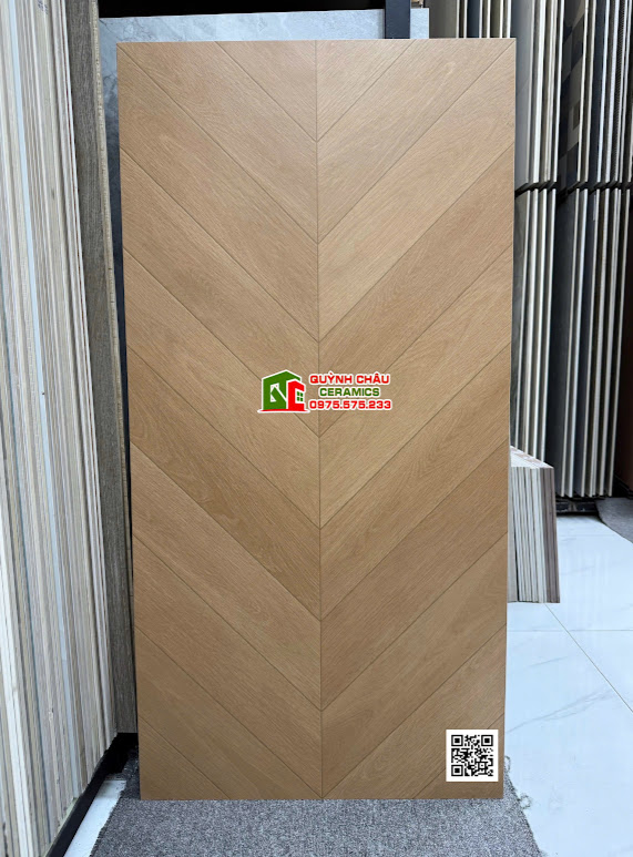 Mẫu gạch lát nền 60x120 vân gỗ xương cá nâu nhạt trung quốc